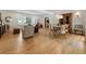 Spacious open-concept design combining living and dining areas with sleek hardwood flooring at 2164 Medfield Trl, Atlanta, GA 30345