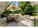 Enjoy outdoor dining and relaxation on the lovely backyard patio with a fire pit at 2164 Medfield Trl, Atlanta, GA 30345