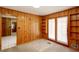 Bedroom with door to the outside and built in shelving at 4545 Gaydon Rd, Powder Springs, GA 30127