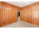Bedroom featuring carpet floors and wood paneled walls at 4545 Gaydon Rd, Powder Springs, GA 30127