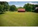 This property includes an outbuilding with convenient vehicle and equipment storage at 4545 Gaydon Rd, Powder Springs, GA 30127