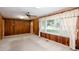 Living room showcasing a large window with curtains and carpeted floors at 4545 Gaydon Rd, Powder Springs, GA 30127
