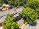 Aerial view of a brick condo complex, showcasing mature landscaping and convenient parking at 615 Pinetree Dr, Decatur, GA 30030