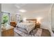 Cozy bedroom featuring neutral tones, a comfortable bed, and stylish decor at 615 Pinetree Dr, Decatur, GA 30030