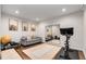 Bright home gym with modern exercise equipment, yoga mats, a large mirror, and a comfortable seating area at 615 Pinetree Dr, Decatur, GA 30030