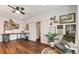 Creative office space with a desk, shelving, and comfortable seating area at 615 Pinetree Dr, Decatur, GA 30030