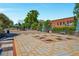 Beautifully landscaped public square with geometric paving, ornamental trees, and comfortable seating, creating an inviting community atmosphere at 615 Pinetree Dr, Decatur, GA 30030