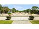 Scenic pedestrian square featuring artistic paving patterns, symmetrical landscaping, and a calming fountain, promoting community interaction at 615 Pinetree Dr, Decatur, GA 30030