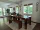 Open concept dining room with hardwood floors and a view of the back deck at 921 Oak Dr, Woodstock, GA 30189