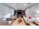 Inviting living room with built-in shelving, hardwood floors and neutral paint at 921 Oak Dr, Woodstock, GA 30189