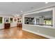 Spacious living room offering an open floor plan to the kitchen and dining area at 921 Oak Dr, Woodstock, GA 30189