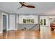 Large open living room showcasing hardwood floors, custom railing and an abundance of natural light at 921 Oak Dr, Woodstock, GA 30189