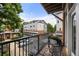 Balcony with table and chairs overlooking parking lot at 1258 Dekalb Ne Ave # 112, Atlanta, GA 30307