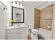 This cozy bathroom boasts a shower-tub combo with updated tile surround and modern fixtures at 1258 Dekalb Ne Ave # 112, Atlanta, GA 30307