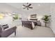 Bright, spacious bedroom with a ceiling fan, natural light, and stylish decor at 1258 Dekalb Ne Ave # 112, Atlanta, GA 30307