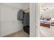 Walk in closet featuring wire shelving and closet organizers with convenient access to the main bedroom at 1258 Dekalb Ne Ave # 112, Atlanta, GA 30307