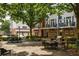 Well-manicured community area featuring mature shade trees, grilling area and seating at 1258 Dekalb Ne Ave # 112, Atlanta, GA 30307