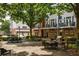 Outdoor community area with grill stations, tables and chairs for outdoor gathering at 1258 Dekalb Ne Ave # 112, Atlanta, GA 30307