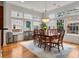 Sunlit dining room featuring hardwood floors and large windows that flood the space with natural light at 1258 Dekalb Ne Ave # 112, Atlanta, GA 30307