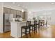 Spacious kitchen with stainless steel appliances, gray cabinets, countertop dining, and eat-in dining area at 1258 Dekalb Ne Ave # 112, Atlanta, GA 30307