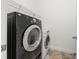 Convenient laundry room with a large washing machine and dryer, perfect for handling all your laundry needs at 1258 Dekalb Ne Ave # 112, Atlanta, GA 30307