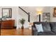 Comfortable living room with hardwood floors, stylish decor, and staircase access at 1258 Dekalb Ne Ave # 112, Atlanta, GA 30307