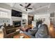 Bright and airy living room boasts coffered ceilings, a fireplace, and an open layout connecting to the kitchen at 1258 Dekalb Ne Ave # 112, Atlanta, GA 30307