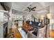 Spacious living room featuring a fireplace, ceiling fan, and ample natural light at 1258 Dekalb Ne Ave # 112, Atlanta, GA 30307