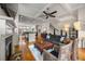 Open-concept living space featuring a fireplace, coffered ceilings, and hardwood floors at 1258 Dekalb Ne Ave # 112, Atlanta, GA 30307