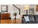 Living room with hardwood floors and staircase at 1258 Dekalb Ne Ave # 112, Atlanta, GA 30307