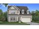Charming two-story home with brick and gray siding, complemented by a well-manicured lawn at 2505 Dixon Pl, Lawrenceville, GA 30045