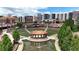 Overhead perspective of a vibrant outdoor amphitheater with lush greenery and a central pond at 338 Sugarview Rd, Sugar Hill, GA 30518