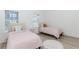 Inviting bedroom with two twin beds, plush bedding, and plenty of natural light at 338 Sugarview Rd, Sugar Hill, GA 30518