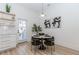 Stylish dining nook features modern furnishings and decor, adjacent to the kitchen area at 338 Sugarview Rd, Sugar Hill, GA 30518