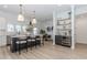 Gourmet kitchen with stainless appliances, wine fridge, and ample counter space, perfect for cooking at 338 Sugarview Rd, Sugar Hill, GA 30518