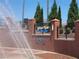 Entrance to the Splash Park features a brick wall with signage and a water fountain at 338 Sugarview Rd, Sugar Hill, GA 30518