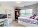 Bedroom with a bed, a desk, a closet and natural light at 3622 Utoy Dr, South Fulton, GA 30331