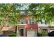Charming red brick townhouse with a well-maintained front yard and attached garage at 3622 Utoy Dr, South Fulton, GA 30331