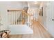 Spacious foyer with a staircase and hardwood floors, leading to other rooms in the home at 3622 Utoy Dr, South Fulton, GA 30331