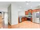 Modern kitchen featuring stainless steel appliances and hardwood floors at 3622 Utoy Dr, South Fulton, GA 30331