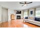 Bright living room with hardwood floors, fireplace, and plenty of space for entertaining at 3622 Utoy Dr, South Fulton, GA 30331