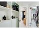 Walk-in closet with built in shelving adjacent to bedroom at 3622 Utoy Dr, South Fulton, GA 30331