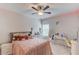 Comfortable bedroom with ambient lighting and décor creates a cozy, inviting atmosphere at 4931 Pauls Pointe, Sugar Hill, GA 30518