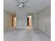 Spacious bedroom with neutral walls, recessed lighting, and access to other rooms at 1901 Paper Birch Cv, Grayson, GA 30017