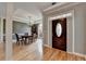 Inviting entryway features hardwood floors, a stylish front door, and elegant trim at 1901 Paper Birch Cv, Grayson, GA 30017