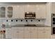 Kitchen with white cabinetry, granite countertops, and stainless steel microwave and oven at 1901 Paper Birch Cv, Grayson, GA 30017