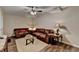 Cozy living room with comfortable leather seating, area rug, and stylish decor at 1901 Paper Birch Cv, Grayson, GA 30017