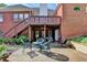 Charming patio area with comfortable seating, perfect for outdoor relaxation and entertaining friends at 1901 Paper Birch Cv, Grayson, GA 30017