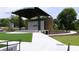 Outdoor amphitheater showcasing a stage, covered seating area, and manicured lawns at 2106 Remy Ct, Kennesaw, GA 30144