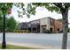 Exterior of a modern brewery featuring a patio area, stone accents, and street frontage at 2106 Remy Ct, Kennesaw, GA 30144